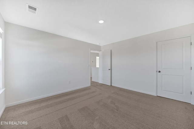 empty room featuring carpet