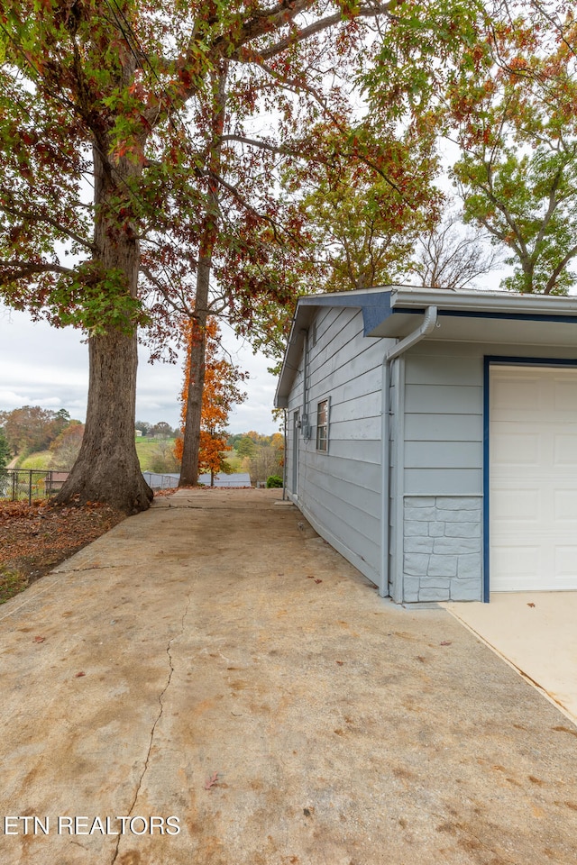 exterior space with a garage