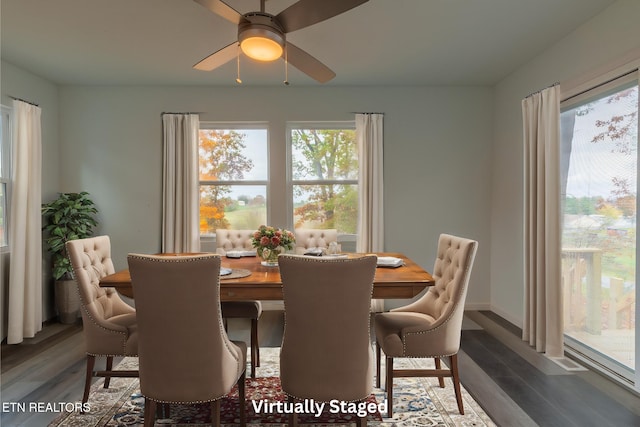 dining room featuring dark hardwood / wood-style flooring and ceiling fan