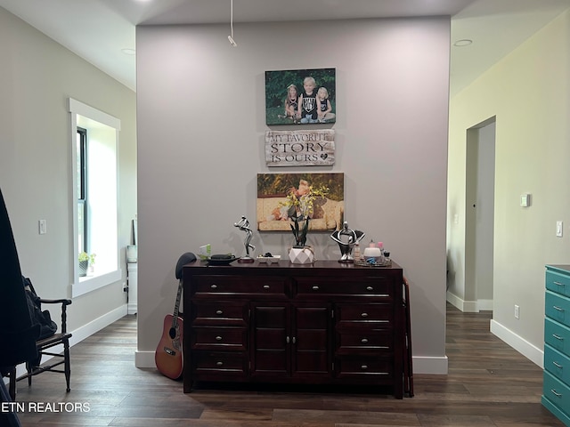 bedroom featuring dark hardwood / wood-style flooring