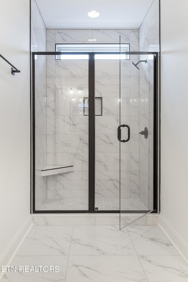 bathroom featuring walk in shower