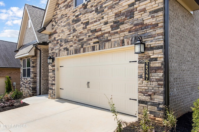 view of property exterior featuring a garage