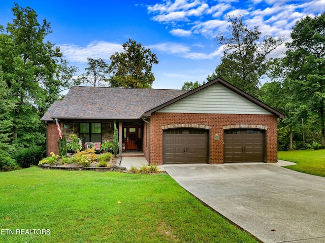 ranch-style house featuring a garage and a front lawn