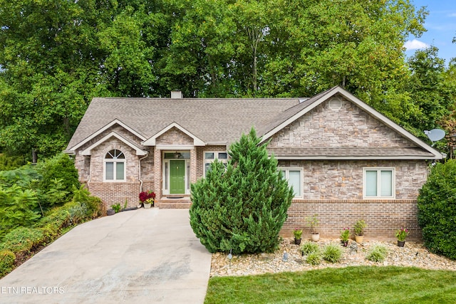 view of front of home with a front lawn