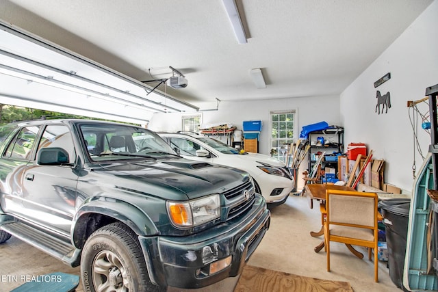 garage featuring a garage door opener