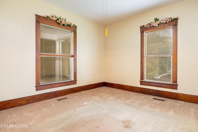1227 N Main St, Sweetwater, TN 37874 - carpeted empty room featuring baseboards and visible vents