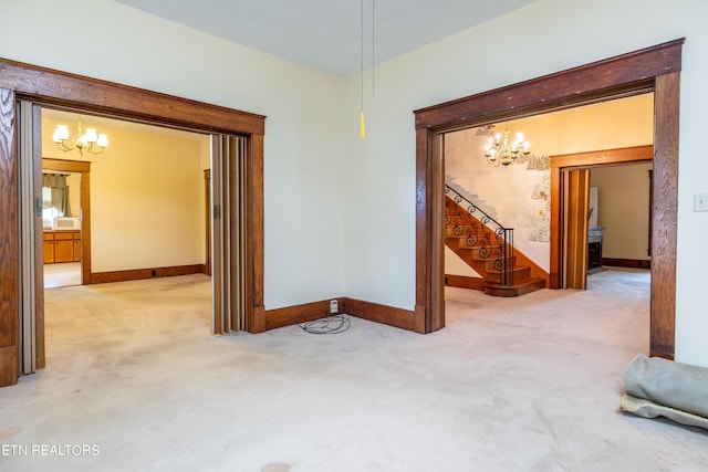 1227 N Main St, Sweetwater, TN 37874 - carpeted spare room featuring an inviting chandelier, baseboards, and stairs