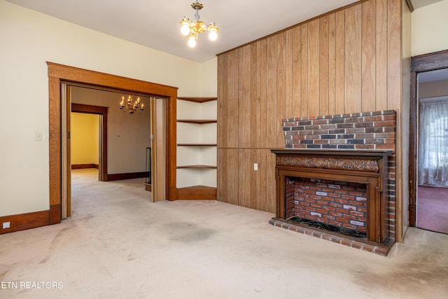1227 N Main St, Sweetwater, TN 37874 - unfurnished living room with carpet flooring, a fireplace, and a notable chandelier