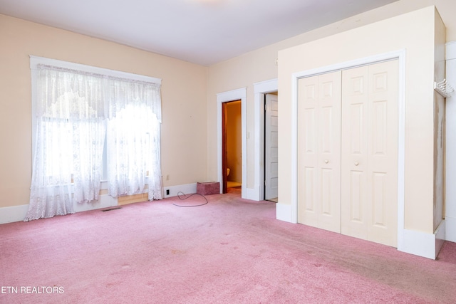 1227 N Main St, Sweetwater, TN 37874 - unfurnished bedroom with a closet, visible vents, and carpet
