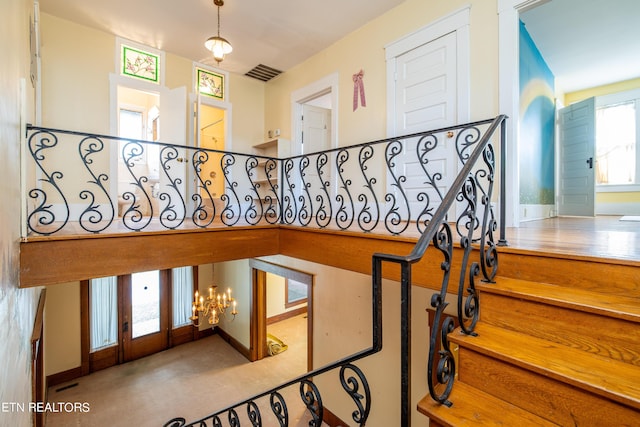 1227 N Main St, Sweetwater, TN 37874 - stairs with visible vents and a chandelier