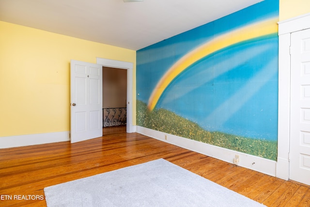 1227 N Main St, Sweetwater, TN 37874 - spare room featuring baseboards and wood finished floors