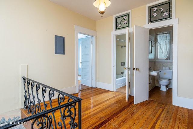 1227 N Main St, Sweetwater, TN 37874 - hall with french doors, wood finished floors, and electric panel