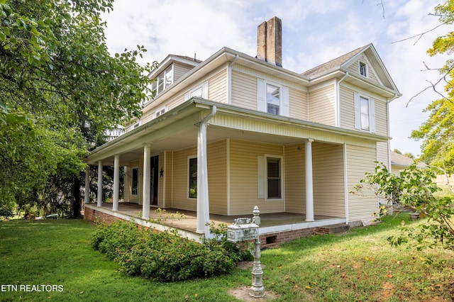 1227 N Main St, Sweetwater, TN 37874 - view of home's exterior with a lawn and a chimney