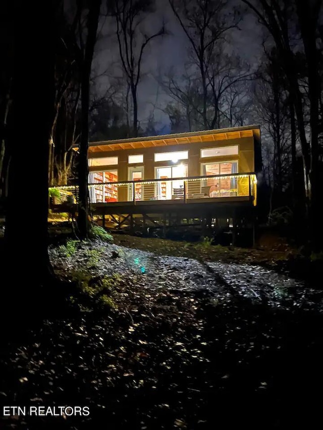 view of back house at night