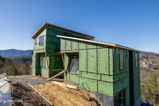 view of outdoor structure with a mountain view