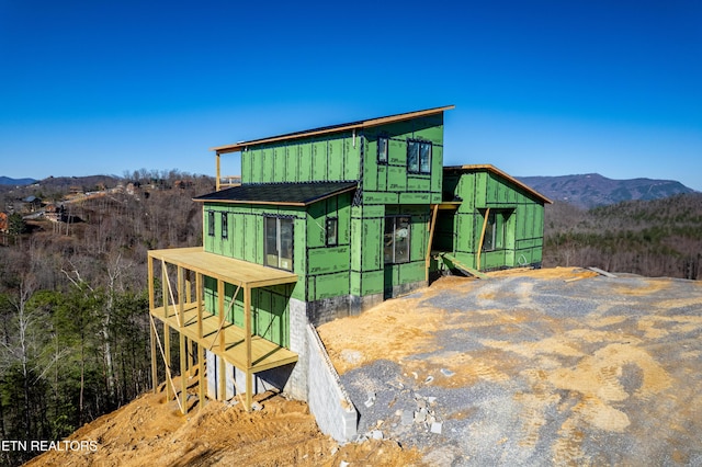exterior space with a mountain view
