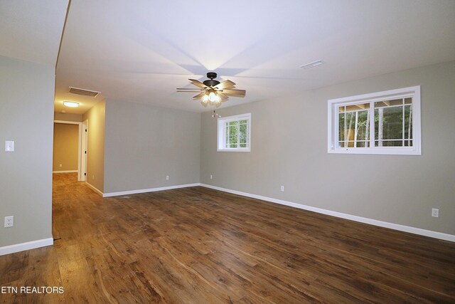 spare room with ceiling fan and hardwood / wood-style floors