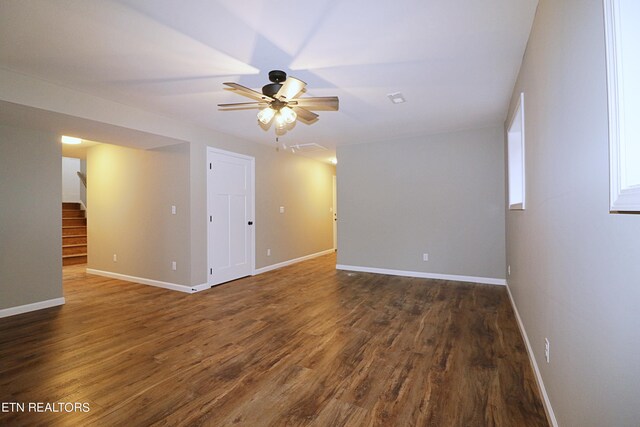 unfurnished room with hardwood / wood-style flooring and ceiling fan