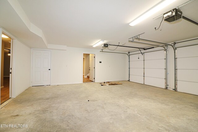 garage featuring a garage door opener