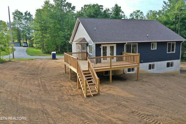 back of house featuring a deck