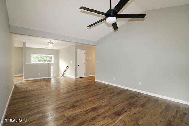 spare room featuring lofted ceiling, ceiling fan, and wood-type flooring