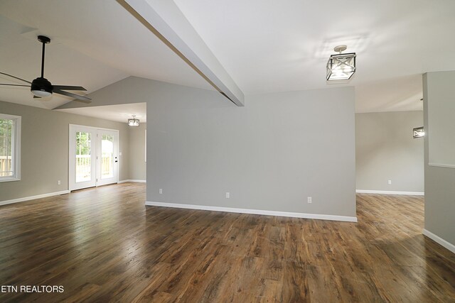 spare room featuring french doors, ceiling fan, lofted ceiling, and hardwood / wood-style floors