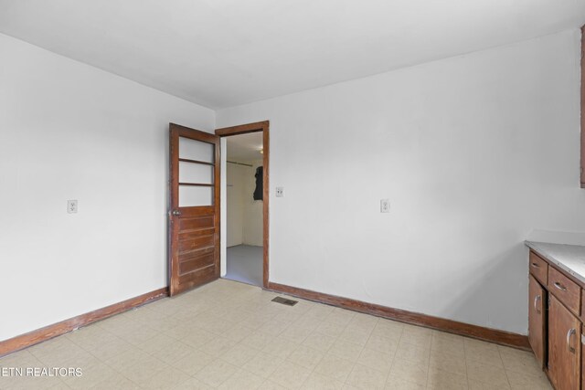 interior space featuring light tile patterned floors