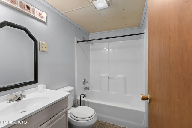 full bathroom featuring tile patterned flooring, toilet, vanity, shower / bathing tub combination, and ornamental molding