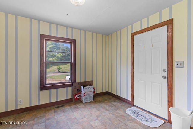 view of tiled foyer entrance