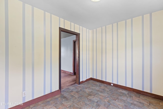 spare room featuring tile patterned flooring