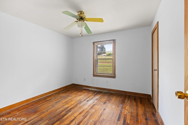 spare room with ceiling fan and hardwood / wood-style floors