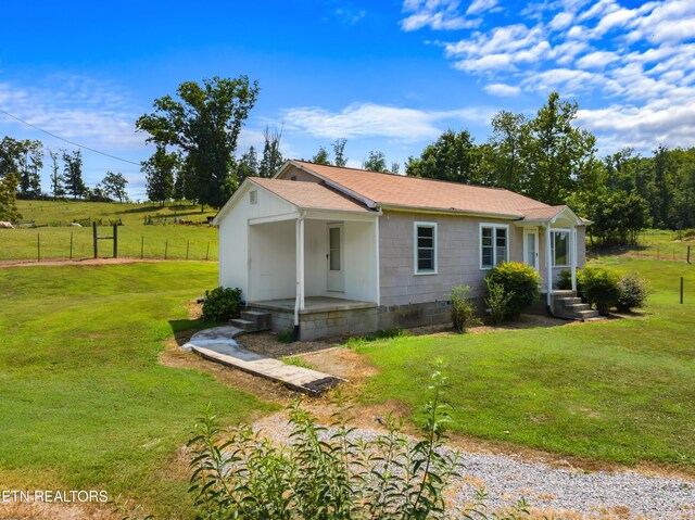 view of front of home with a front lawn