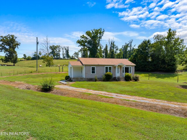 single story home with a front yard