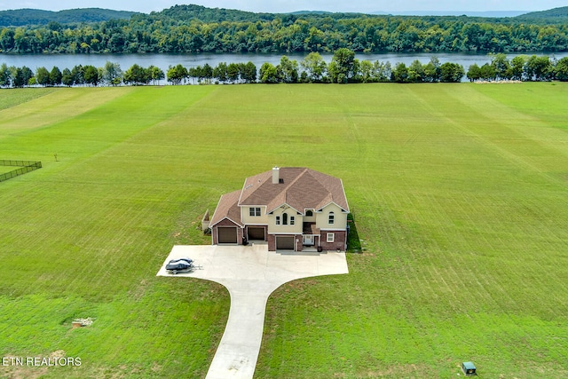 bird's eye view featuring a water view and a rural view