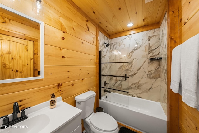 full bathroom with toilet, wood walls, wooden ceiling, vanity, and tiled shower / bath combo