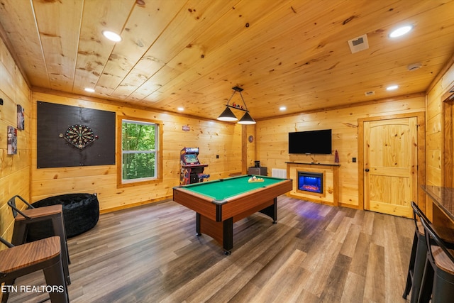 game room featuring hardwood / wood-style floors, wood ceiling, wooden walls, and pool table