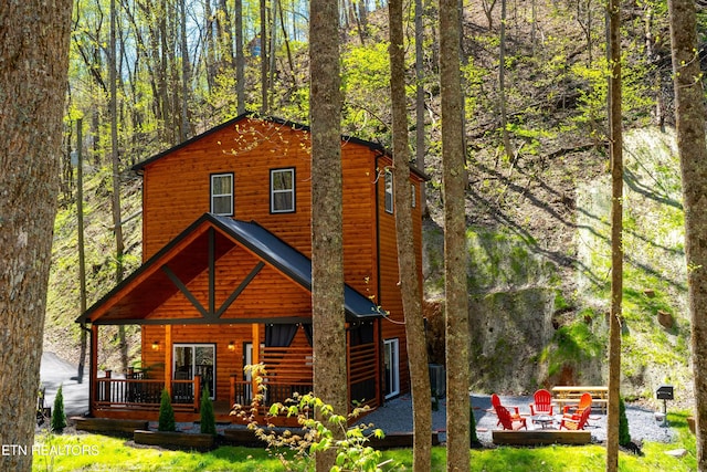 view of log cabin