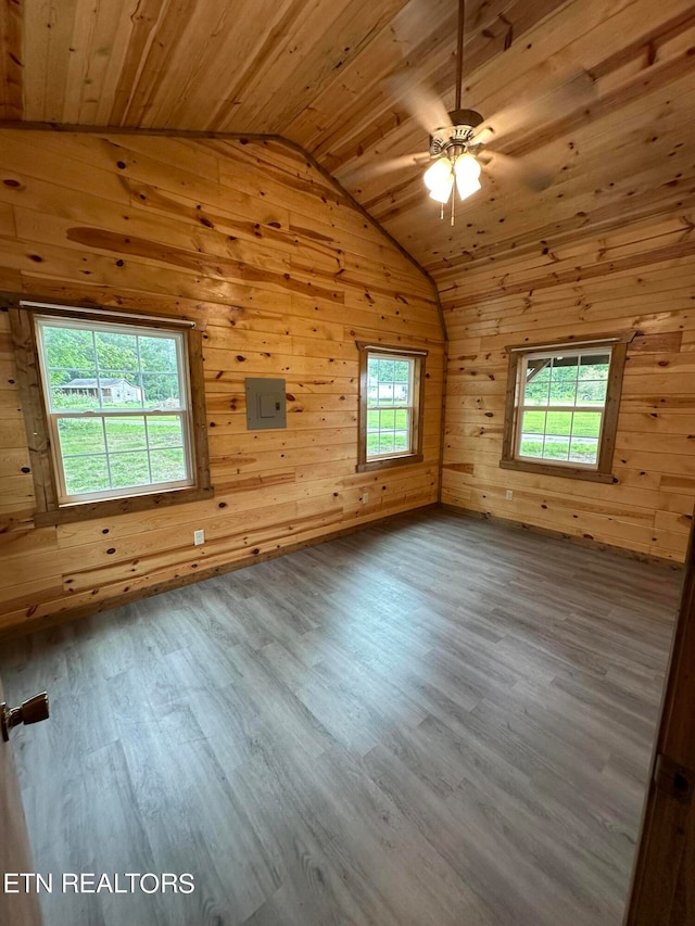 unfurnished room featuring wood ceiling and hardwood / wood-style floors