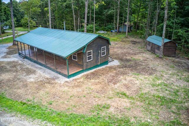 exterior space with an outbuilding