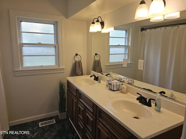 bathroom featuring vanity