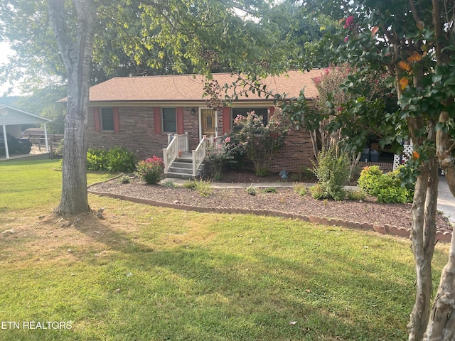 single story home featuring a front yard