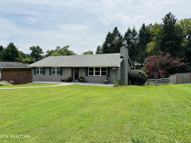 view of front of property with a front lawn