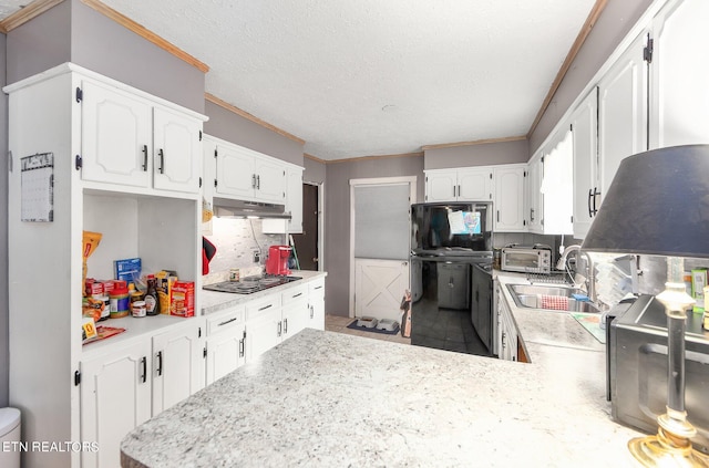 kitchen featuring white cabinets, sink, kitchen peninsula, decorative backsplash, and gas stovetop