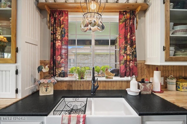 kitchen featuring an inviting chandelier and sink