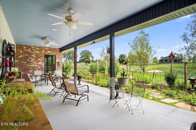 view of patio / terrace featuring ceiling fan