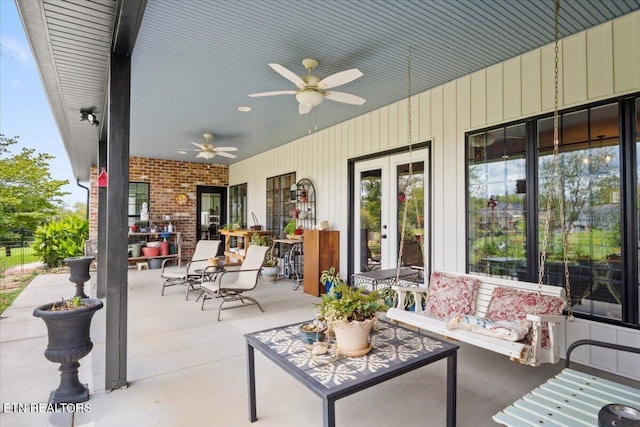 view of patio featuring french doors and ceiling fan