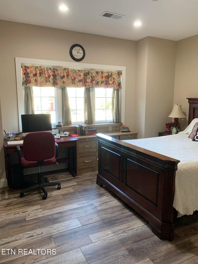 bedroom featuring light wood-type flooring