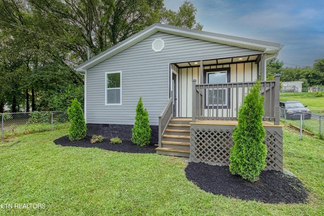 view of front facade featuring a front yard