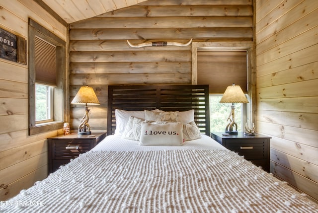 bedroom featuring lofted ceiling