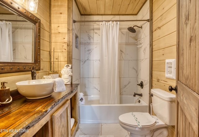 full bathroom featuring vanity, shower / bathtub combination with curtain, wood walls, toilet, and wood ceiling